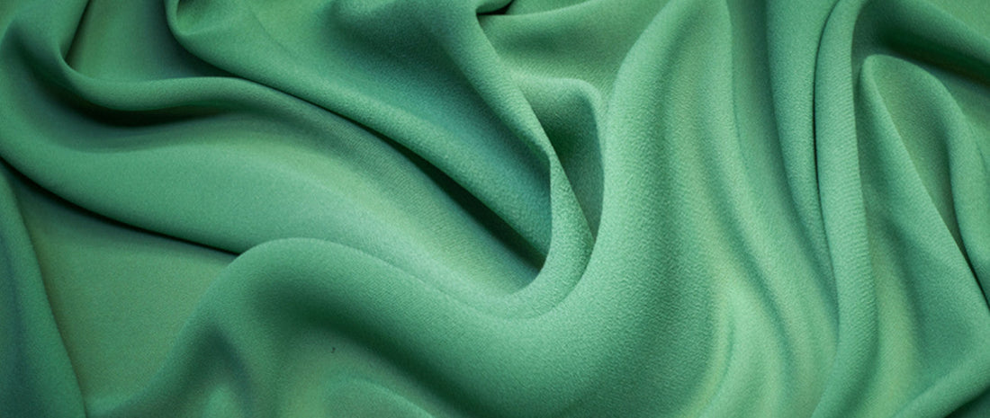 Zöld anyagminta a poliamidról.